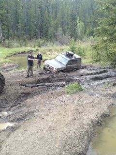 Tried to go around this mud hole and got hung on the axle! McClean Creek Alberta Canada.