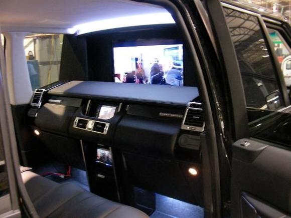 26" HD TV/Radio/DVD/Real Wood and leather(Same grade as Bently) bar/charging station and buildin HDMI &amp; USB connector for laptop/Touch Screen control everything(Lighting, media, A/C, recliner seat, Smart Glass divider, Remote foot rest, Freg.......too much to list