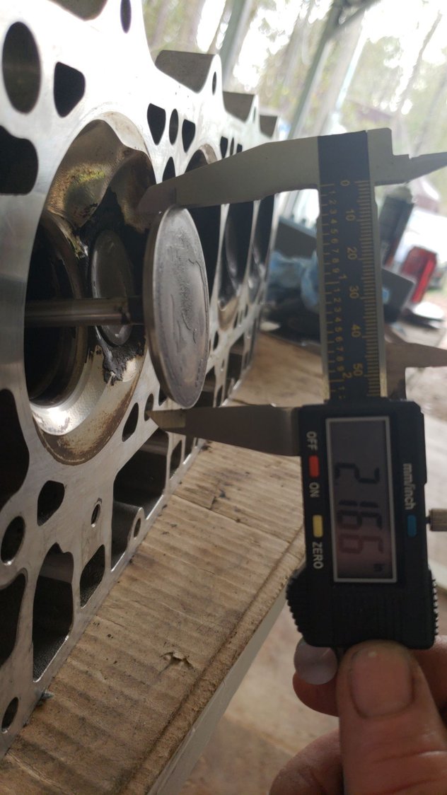 Here's was the reason. Take a look at the edge of that intake valve. They all looked like this and needless to say I was upset to have been ripped off!