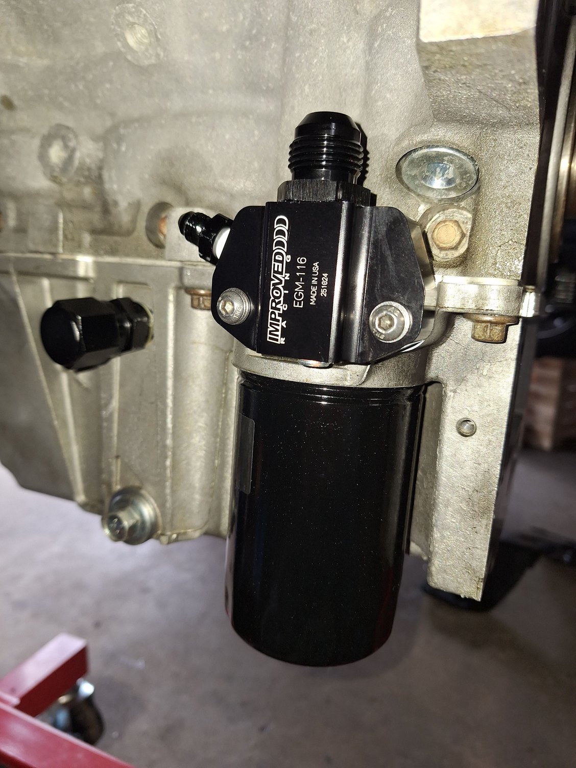 Improved racing accumulator adapter