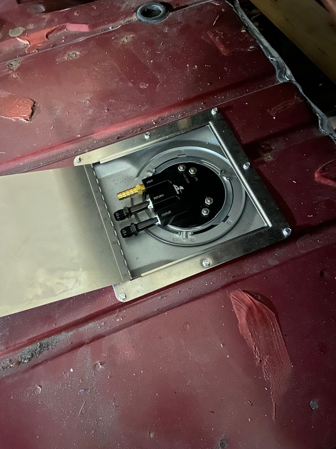 Have new stealth fuel tank from Aeromotive. Cutout and bought trap door from summit to give east access if needed. Have it a clean look