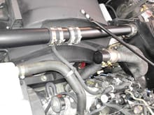 Run hose to pass side valve cover, reuse steam tube holder on radiator hose, as it is now a pcv hose holder.....