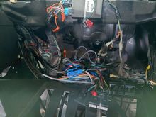 Behind the stereo, most of this wiring runs to the radio or the switch panel in the vent above the radio.