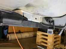 On the driver's side, I noticed that the crossmember wanted to sit just on the front edge of the weld tab of the SFC.  What to do?