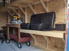 Rear seats/seat belts removed. Built a shelf in the shed to store them and other parts on. Need to get plastic bags to wrap them in. 