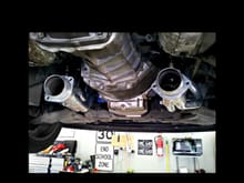 Found this pic online, figured if i welded them, one on each pipe, on the insides near the flange, facing the tranny, looks like plent of room to me? Or im wrong