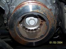 underdrive pulley.  a little surface rust from sitting in the garage for a year.  about an hour of actual run time on this.