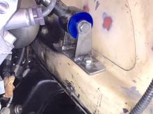 Torque strap bolts to driver's side head
