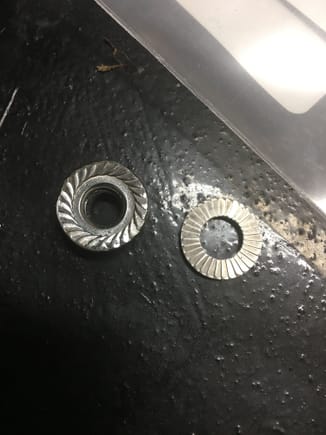 Header stud nut on the left, nord loc washer on the right. 