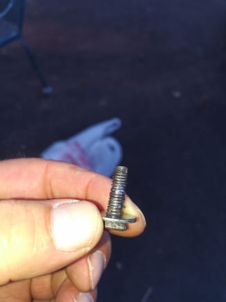 The bolt had been in there for a while because the head is worn down. 