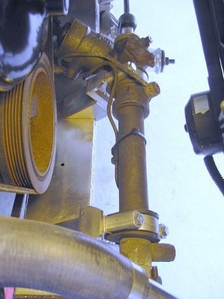 ZF rack and pinion as seen from above from the passenger side. The stanchions are made from stainless, the retaining caps are aluminum. The rack was rotated until the input shaft was at 25 degrees from the horizontal. The power front steering rack setup on the the Avanti has the inner tie rods in line the the A-arm pivots.