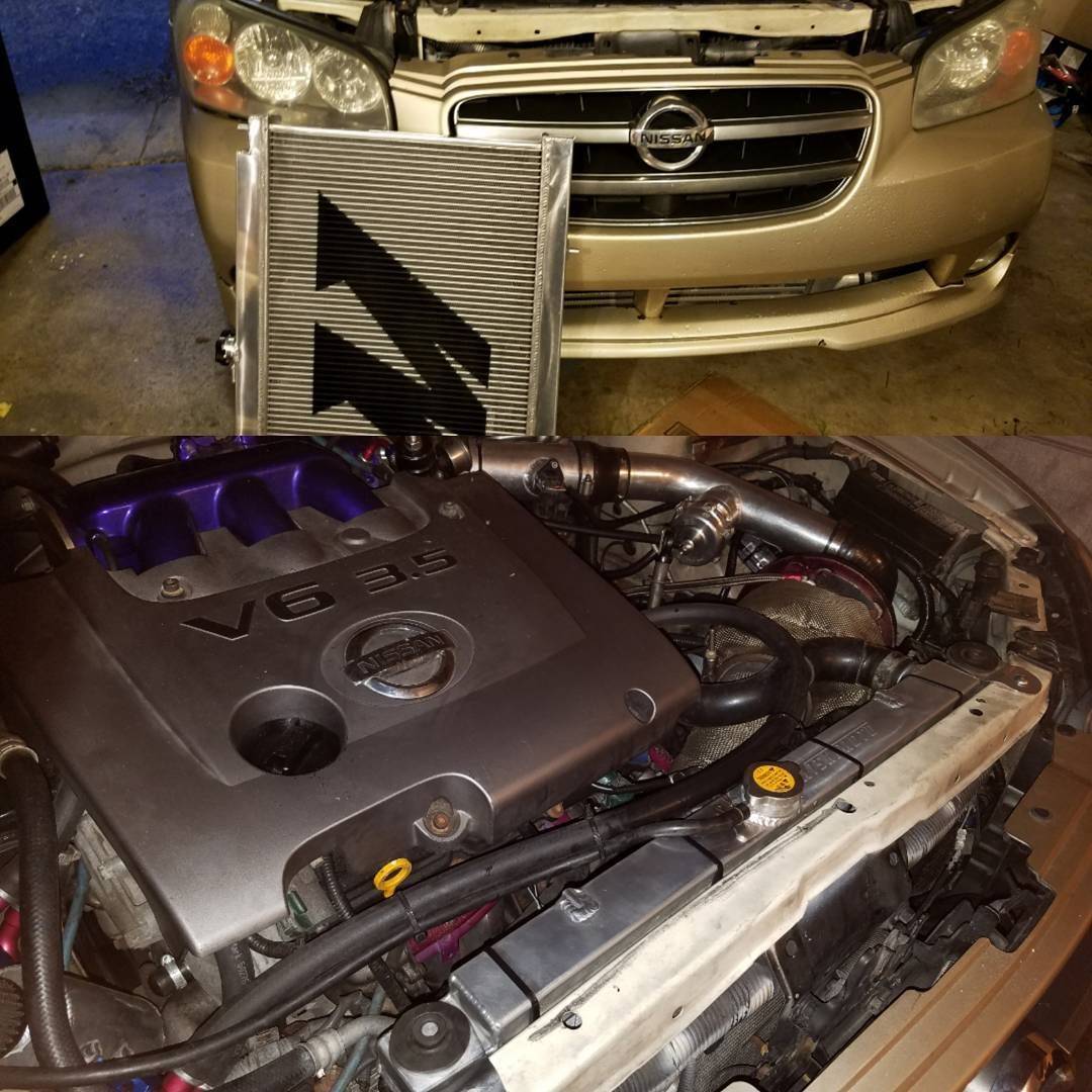 Hammered out a Mishimoto radiator to fit the car. No more overheating. One year down and car still running strong at 165k miles.