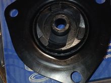 Rear side of 'Moog' mount where the spring would seat into the mount. There's a small black 'tube' in the middle, as shown in the pic.