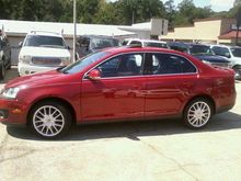 the red gli i mentioned earlier its a six speed. it was def.. fun to drive and to hear that turbo spool got my girl wet but still had to go with the max. vw arent as reliable as nissan and a whole lot cheaper to repair or even oil change got qouted over 60$ for the vw oil change
