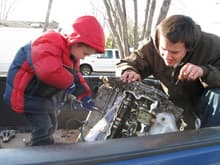 The boy and i taking off the timing cover off the de-k