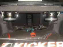 2 Incriminator Audio Flatlyne subs in IB under rear deck venting thru 12" cutouts.