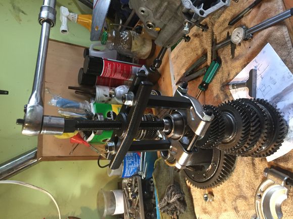 Removing the front (tranny case side) main shaft bearing.