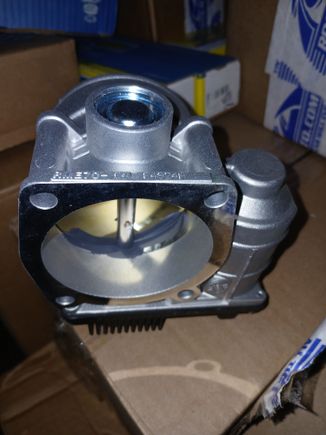 Well, the mounting area for spacer kits is a direct-fit no matter whether it's a 70mm or 75mm TB. The plastic TB mounts are the same. The bolts and gaskets for 70mm/75mm are the same size since both TB are the same size. So they'll mount correctly from the TB to uim plenum elbow perfectly. The plastic gasket that came with this TB is roughly 3-1/2 inches length/height for either mm TB.