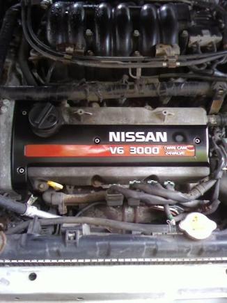 spark plug cover mod installed (not perfect but it works the spot on the rite is where i had to touch up)