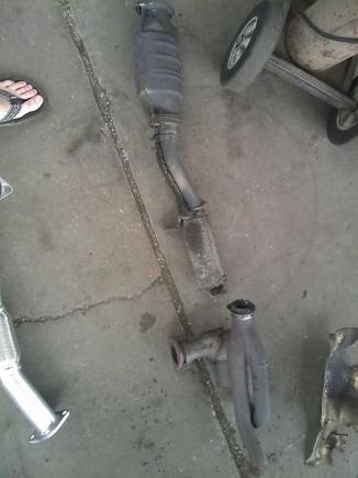 The old y-pipe and cat. The thing was rusted on there so tight we had to cut it with a torch at the flex section and cut it again where it meets the precat.