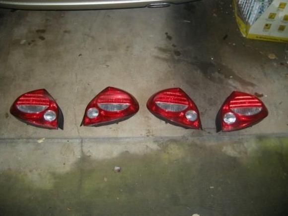 sellin' these (2) pairs of OEM tail lights. Message me if your interested..