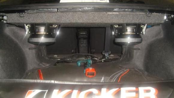 2 Incriminator Audio Flatlyne subs in IB under rear deck venting thru 12" cutouts.
