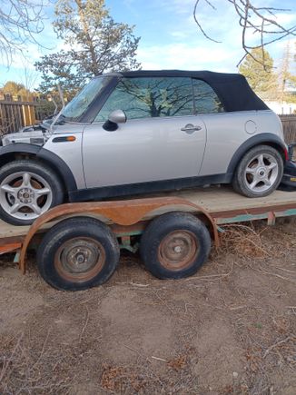 "That will buff out..not!" Top and interior in great shape. Tires and wheels good condition.