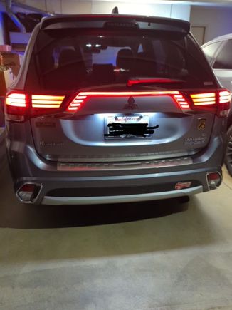 This backlight can light up as brake light and turn signal as well, very fancy as the installer said, it took him about 1.5 hours to install, lots of cable routing.  $100 labor, $100 for the light from TaoBao.com,

https://detail.tmall.com/item.htm?abbucket=16&id=720269391198&ns=1&spm=a21n57.1.0.0.ad7e523ctP0a5i&sku_properties=6939376:3809527;228740749:24329448037

It costs about $110 and about $40 shipping from China.
