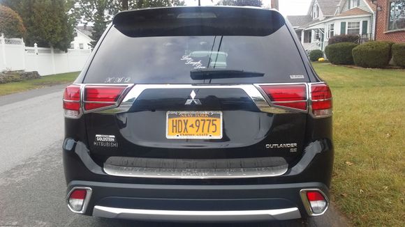 Rear wing added & taillight trim.