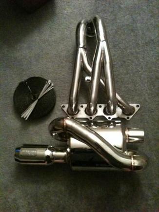 obx header and twin loop 2.5 to 3.0 muffler ( got rid of the SRS fart can, it was wayyy to loud) and black exhaust wrap