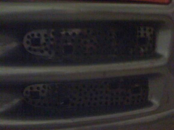 Holes in the bumper right in front of the cold air intake filter allow more air to flow and get to the intake