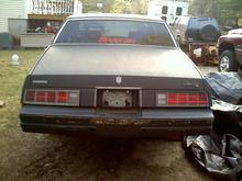 Car was originally greenish teal, currently sitting in black primer, undecided on the final color.