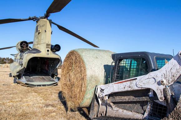 Loading the Hay in the Chinook