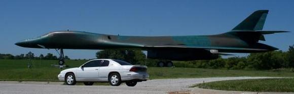 An early B-1 bomber placed near the museum driveway.