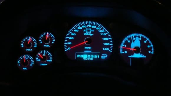 my gauges at nite. i have been thinking or replacing an order with the same red background but with red nite time lighting. goes with the theme of the car