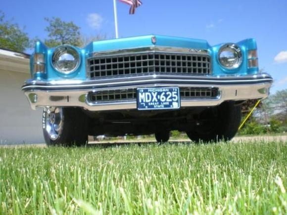 I love this shot. Notice the old school half moon headlight covers?