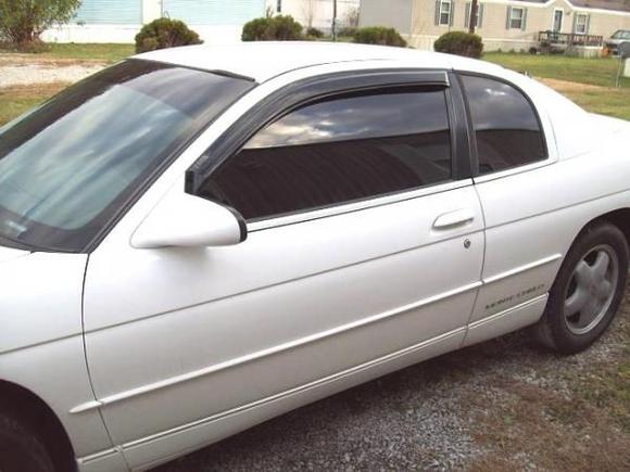 Closeup of the tinted windows and Ventvisors.
