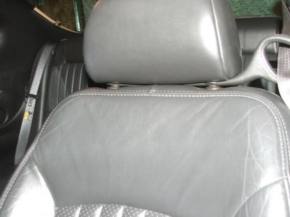 Drivers Black Heated Leather Seat: Headrest And Upper Half