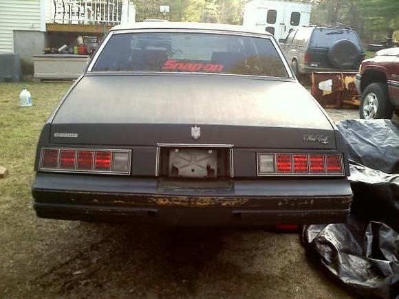 Car was originally greenish teal, currently sitting in black primer, undecided on the final color.