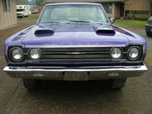 I have another hood and a correct set of scoops that will be painted to match the car, so with a quick hood change, I can have two very different looks.