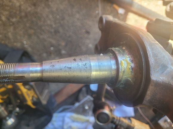 OK so when I was going to try everything to put everything back on and do the adjustments like you all said and going by all the links you all shared I noticed the spindle looks VERY VERY worn down like it was rubbing against something any suggestions before I try and put it back together please