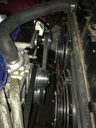 This pulley set up is the reason for the duel fans. The single was about 1/4 inch into the water pump pulley. With two they kind of straddle it. 