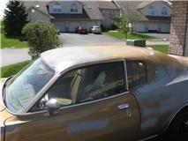 Vinyl Top was white and torn in several places