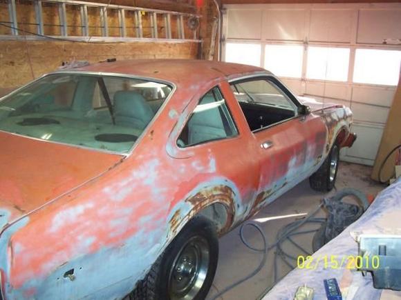 Paint wornoff. Install a quarter panel patch after repair of inner wheel well.