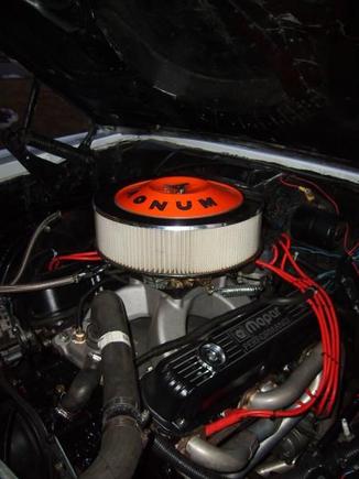 360 LA, with 360J heads ported polished by D.S.E.
 M1 intake, 750 Nascar double pumper, MSD 6AL, Ceramic headers, Solid lift cam with crane 1.6 aluminum roller rockers.  9.5 speed-pro pistons. Eagle I beam rods.
 727 with 4200 converter and 4.30 gears.