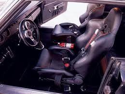 69 interior, car is in black primer, Procar buckets, Grant Steering wheel, etc