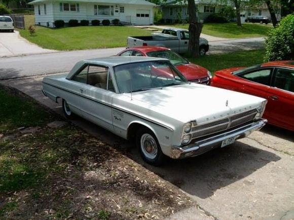 Front end on the fury. The passenger bezel is a bit crooked, but a few whacks with a rubber mallet got it good as new. Same with the few places on the grill where there were small dents. All the trim arounf the headlights and front of the grill is dinged and dented pretty bad so I removed it. Luckily there was only one major dent under it.