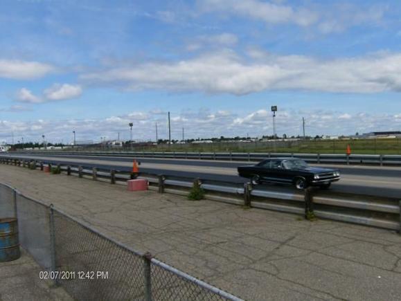 Miramichi Dragway Park . My 68 year old father racing his
  baby, red lines and all. Car was running mid 14' s.