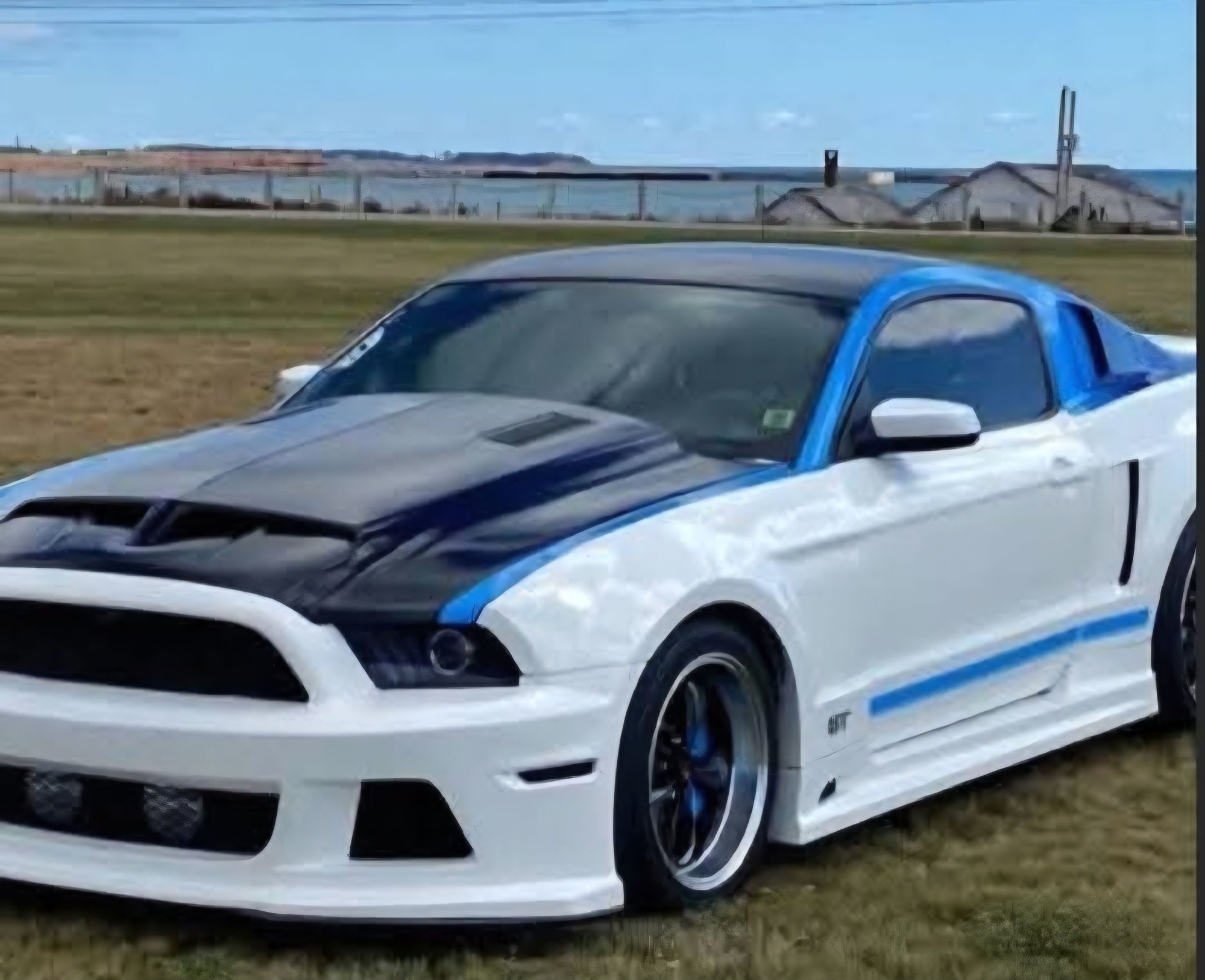 My new to me 2011 GT with a APR wide body kit with a replica 1968 Shelby GT500 KR hood & Roush supercharger.