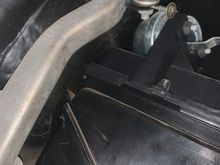 I had my uncle put the bolt and nut setup on the cable awhile back since the gas pedal had a lot of play in it and would move back and forth and also sit close to the firewall. This may be the issue since it’s held pretty tight now and the gas and brake pedal are nearly even with each other.